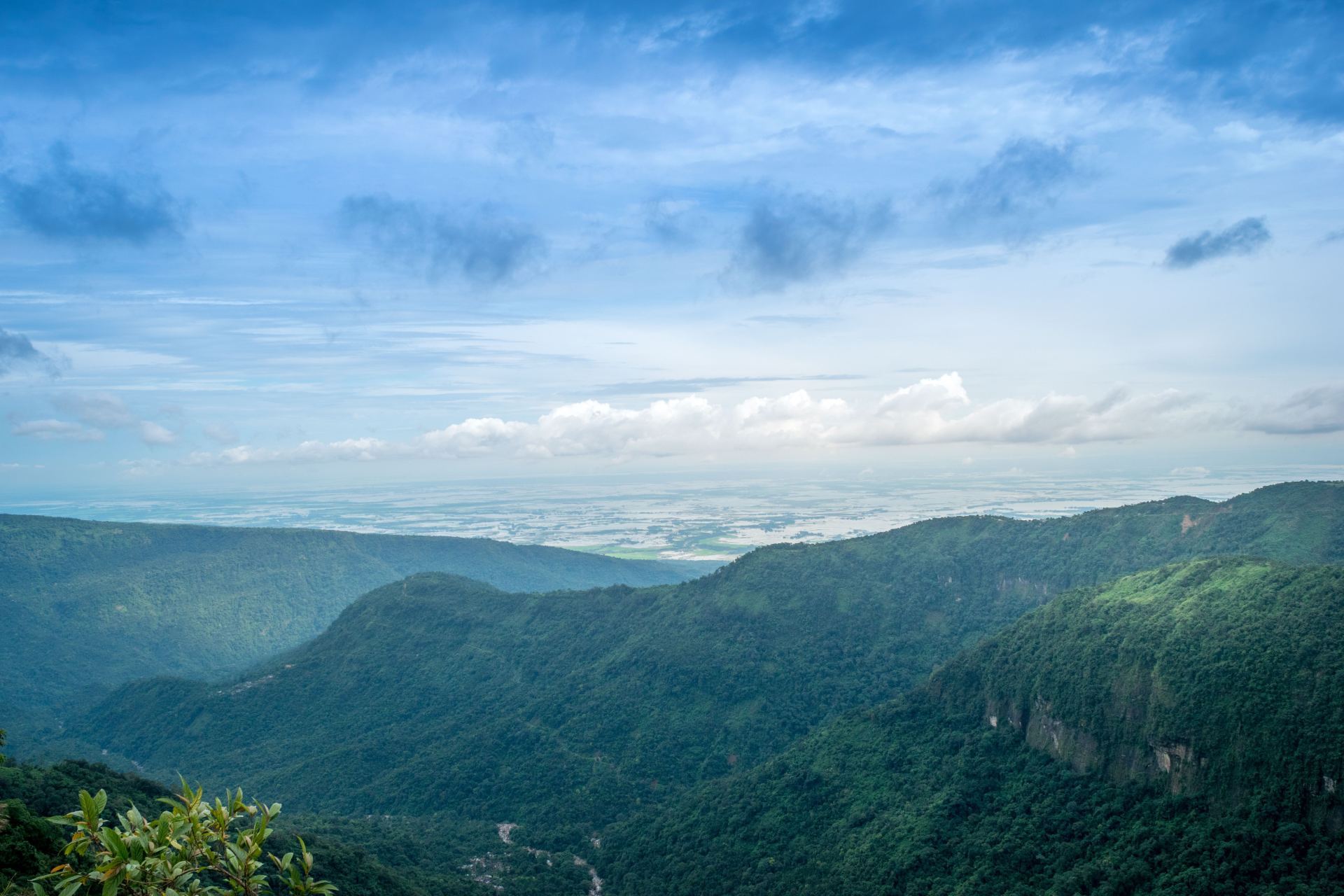 Viewpoint over hills and distant plains